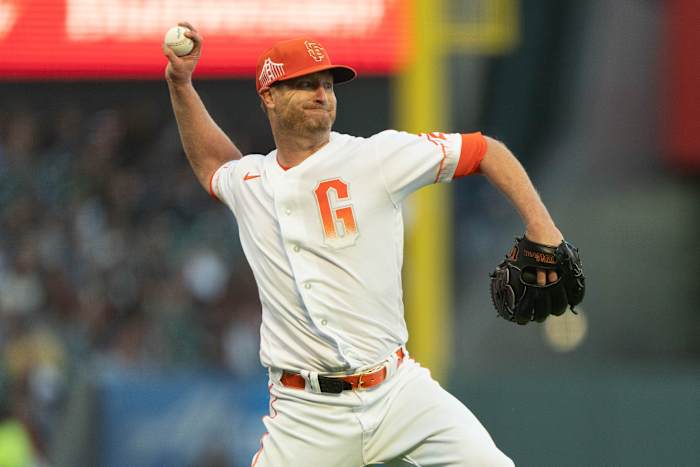 SF Giants starting pitcher Alex Cobb throws to first base during the fifth inning against the Oakland Athletics at Oracle Park on June 25, 2023.